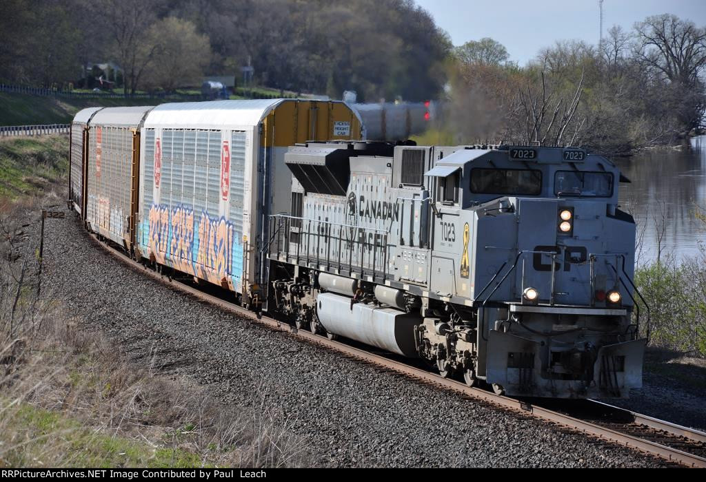 Vehicle train rolls east behind the Air Force unit